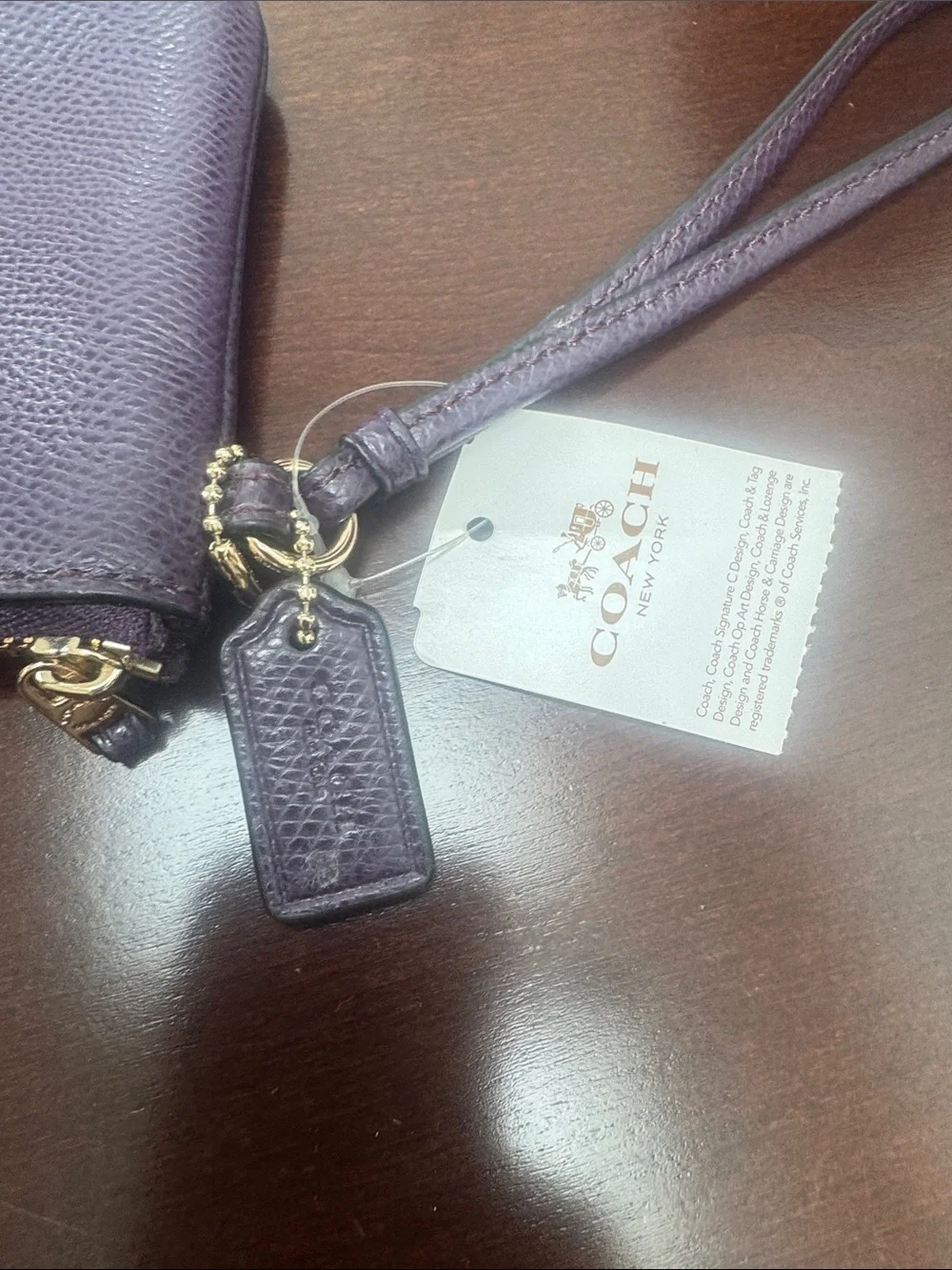 Coach clutch wristlet
